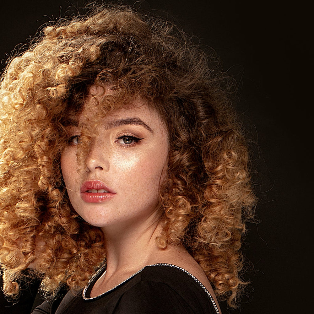 Kératine pour Cheveux Frisés : Le Secret pour des Boucles Sublimées et Hydratées